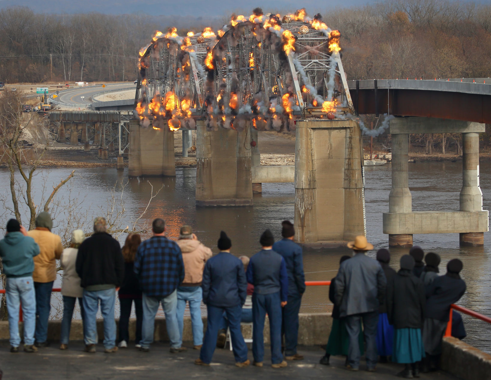 Final section of old Champ Clark Bridge demolished